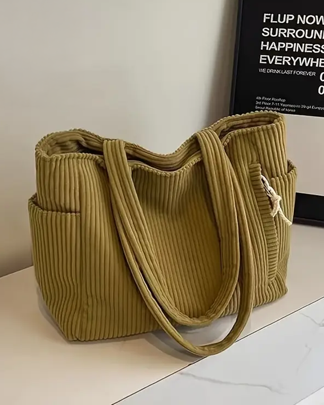 Tilda – Bolsa de mano acanalada con detalle de cordón