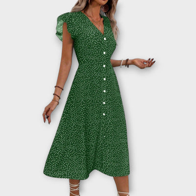 Elegante vestido midi de lunares