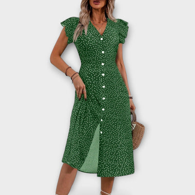 Elegante vestido midi de lunares